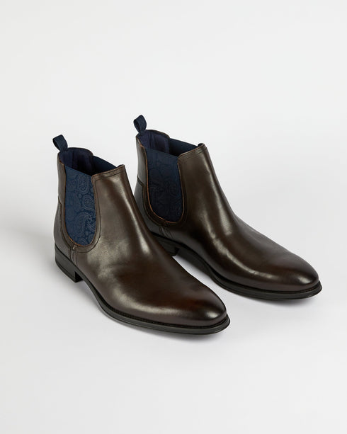 <P Class="Description">A Staple Pair For The Modern Gent, Our Tradd Boots Give Any Ensemble A Classic Upgrade. Crafted Fro...